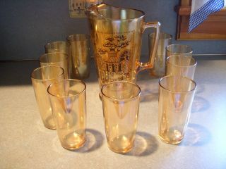   Marigold Amber Decorated Carnival Glass Pitcher & 10 Drinking Glasses