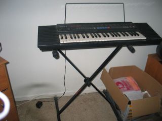 Yamaha electric piano 49 keys comes with stand (many extra functions 