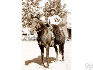 Photo Young Cowboy Woolie Chaps & Riding his Horse