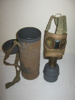 Antique french gas mask in canister issue dated 1944.