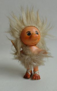 Vintage Rubber Blond Caveman troll with stick figure 5.1