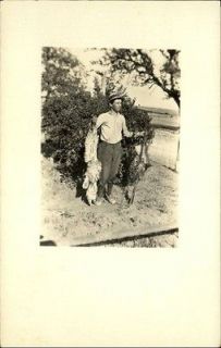 Hunter Holding Dead Birds Rifle Real Photo c1910 Postcard
