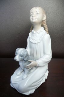 Nao Lladro: porcelain figurine of girl with her dog