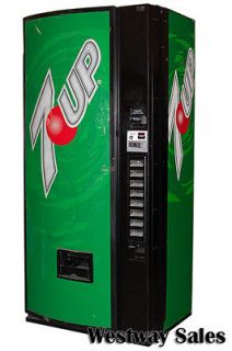 Dixie Narco 440 SIID Multi Price Soda Can Vending Machine with 7 Up 