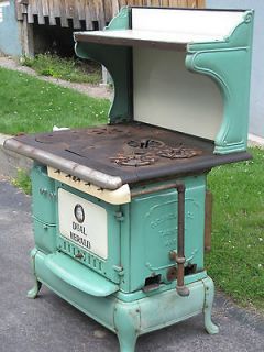 Antique Dual Herald gas/coal/wood Stove