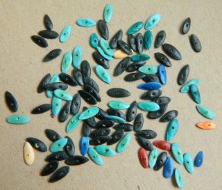 Cantalope Seeds Beads. Each seed is hand painted and hand drilled.