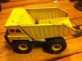 Vintage Remco Toy 1986 Caterpillar Dump Truck 10x5½x5½ Inches