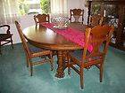 Antique Dining Room Set made of Tiger Oak with six chai