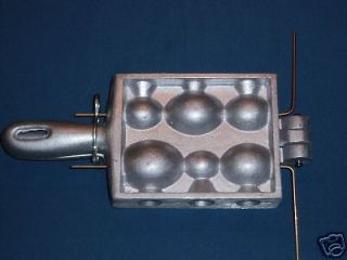 http://img0110.popscreencdn.com/155853351_egg-sinker-mold---12356-8-oz-weights-weight-mold.jpg