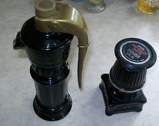 Vintage Avon decanters, Water pump and Pot Belly stove