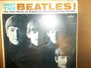 MEET THE BEATLES THE FIRST ALBUM BY ENGLANDS PHENOMENAL POP COMBO 