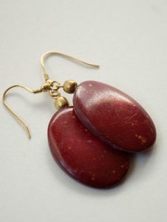   trendy rich merlot color Polished Coconut oval shaped dangle earrings