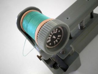   Dial A Stitch Hand Held Plastc Sewing Machine with Wooden Spool