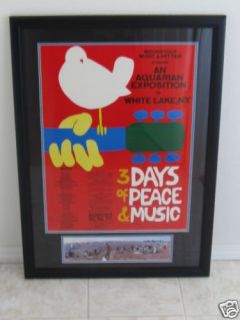 Offered here 1 Framed Original 1969 Woodstock Poster & Ticket in Mint 
