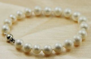   auction price of 7 8 mm white defects freshwater pearl bracelet 7.5