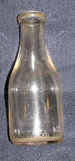 antique one quart milk bottle  7 99