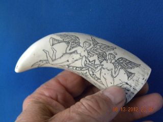 New Scrimshaw sperm whale tooth replica. two angels over HMS Victory
