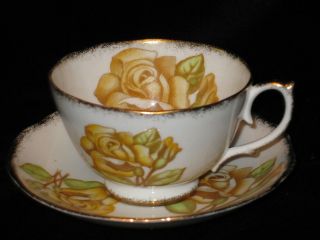 Roslyn China   #8556   Yellow Rose with Green Leaves   Cup & Saucer 