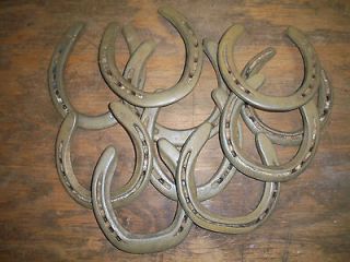 10 USED STEEL HORSESHOES. MIXED SIZES AND BRANDS (CLEANED)
