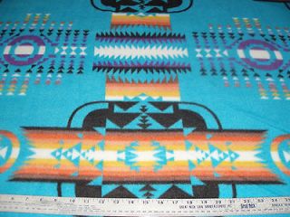 Fleece fabric Aztec Native American South West on Blue BTY