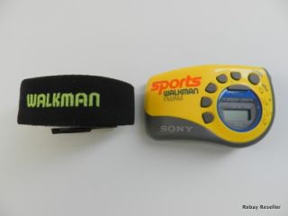   srf m78 sports walkman portable personal am fm radio w arm band yellow