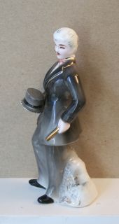 Vintage Porcelain Figurine of Man with Hat