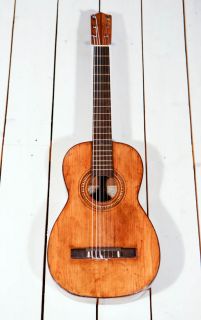 Here is an awesome example of a very old flamenco guitar, made in 