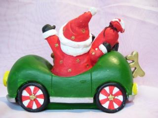 Whimsical Santa Snowman Race Car Christmas Shelf Decor