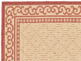 full view of large natural red border rug