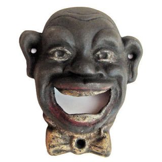black cast iron wall mount bottle opener smiling man time
