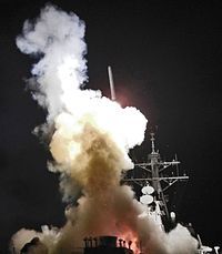 The Barry firing a Tomahawk missile during Operation Odyssey Dawn 