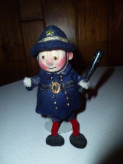    Cloth Policeman Doll Holding a Billy Club Signed By Judy Battaglia
