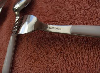   piece set of WMF William Fraser Stainless flatware with white handles