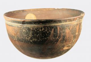  pottery drinking vessel £ 200 a megarian brown glazed pottery bowl 