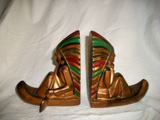 Antique Indian in Canoe Polychrome Bookends Pair by Ronson, ca. 1930 