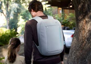The Slim Back Pack has room for all your essentials. (Gray and light 