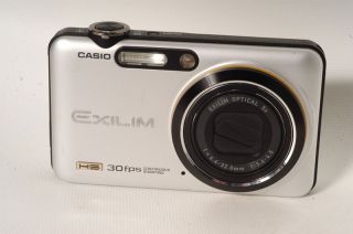 Casio Exilim Model EX FC100 Point Shoot Camera 9 MP 5X Opt Zoom 