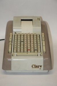 Vintage Clary Adding Machine/Calculator with original cover.