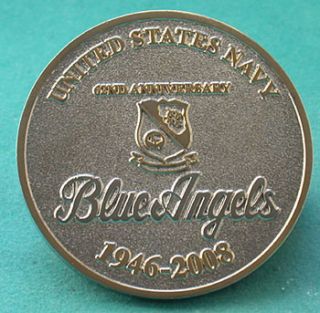 COIN MEASURES APPROXIMATELY 1.75 INCHES IN WIDTH.