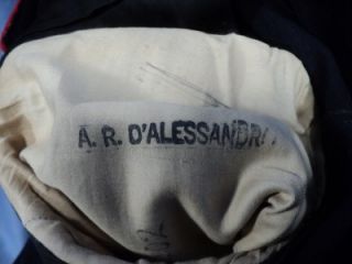 Ink stamped in both shoulders of uniform and pants A.R. DAlessandro.