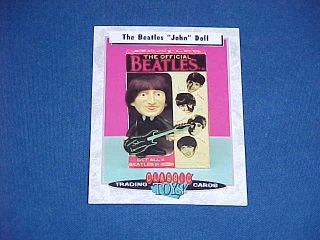 fab four card is 13 is nm mint shows photo of toy