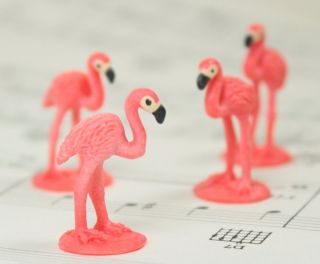 these are cute hand painted soft rubber flamingos that are about 1