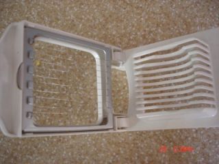 This is an egg slicer from the Pampered Chef. It slices boiled and