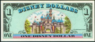 are bidding on a mint series 1994 disneyland dollar the picture shown