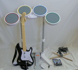 Rock Band Wii w Drums Microphone Fender Guitar USB Dongle and Sticks