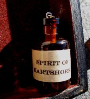 Spirit of Hartshorn smelling salts miniature glass bottle pendant
