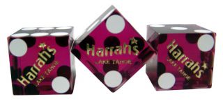 matching harrah s casino dice in a clear plastic tube