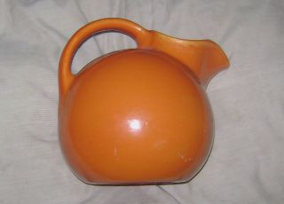 Vintage Rumrill Red Wing Orange Ball Pitcher