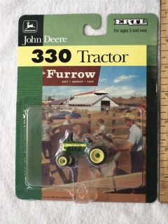 John Deere 330 Tractor Toy Ertl 2000 1 64