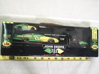JOHN DEERE SEMI TRANSPORTER WITH CAR # 23, 1996, 1/64 TRUCK TRACTOR